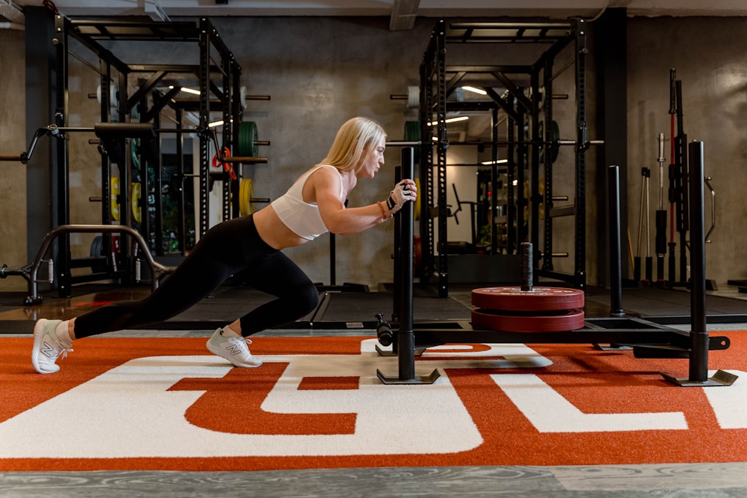 Caucasian Women with White Hair Performing Prowler Workouts